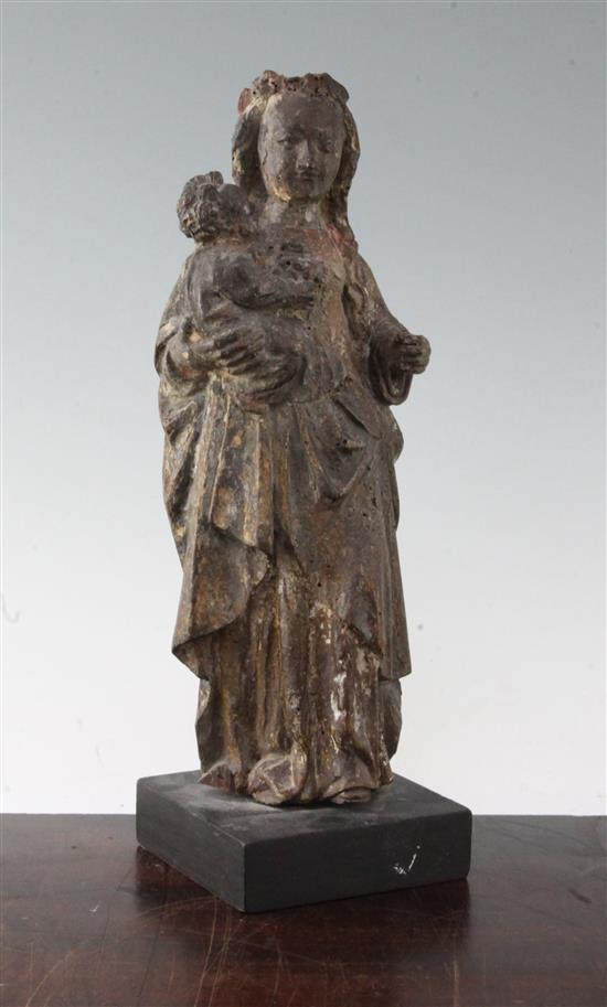 A 16th century European carved and painted figure of the Virgin Mary and child, overall 12.5in.